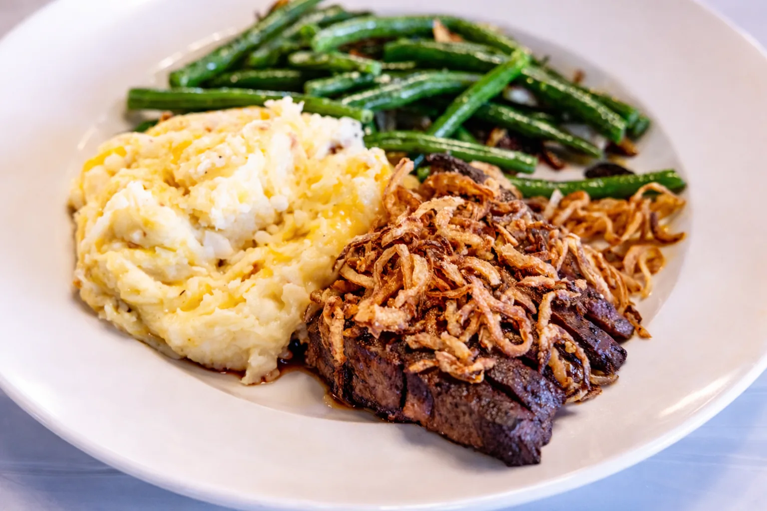 Steak with mashed potatoes and green beans from the Jameson's kitchen